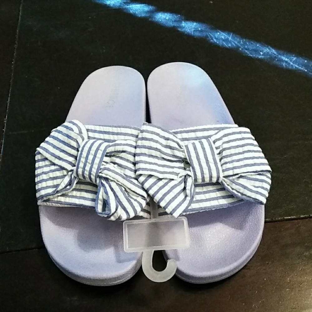 Blue and white flip flops